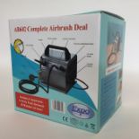 An Expo AB602 Complete Airbrush Deal in box. As ne