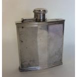 A good silver engine turned hip flask with hinged