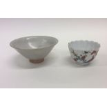 A good Antique Chinese tea cup with wavy edge toge