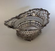 An attractive pierced silver sweet dish on bracket