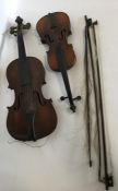 Two old violins and bows. Est. £30 - £40.