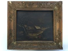 A framed oil on panel depicting a winter scene wit