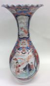 A good Japanese floral decorated vase with wavy ed