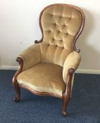 A Victorian mahogany button back nursing chair on