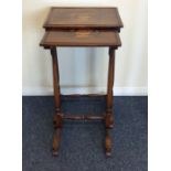 A nest of two rosewood tables, the rectangular top