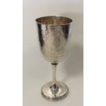 A Victorian silver engraved goblet decorated with