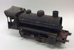 A large mechanical steam train painted in black wi