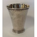 A Continental tapering silver beaker inset with co