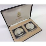 A cased Bahamas Anniversary two coin $10 Proof set
