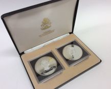 A cased Bahamas Anniversary two coin $10 Proof set