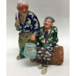 A 19th Century Japanese porcelain group modelled a