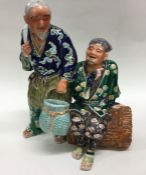 A 19th Century Japanese porcelain group modelled a