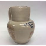 An English stoneware oviform brown glazed jug printed in sepia