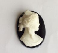 An unmounted hard stone cameo of a lady. Approx. 2