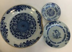 A Chinese blue and white shallow dish decorated wi