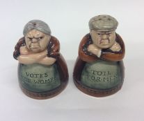 A good pair of Royal Doulton pepper and salts in t