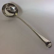 A heavy silver bead edge soup ladle. London. By GA