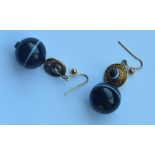 A good pair of heavy banded agate drop earrings wi