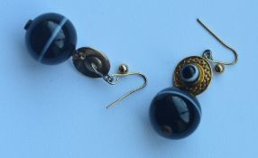 A good pair of heavy banded agate drop earrings wi