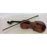 A cased violin together with a bow. Est. £80 - £12