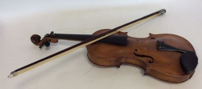 A cased violin together with a bow. Est. £80 - £12