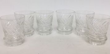 A set of six large cut glass spirally fluted beake