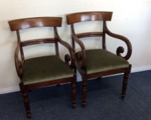 A pair of Georgian carver chairs on turned support