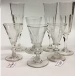 Three Antique glass flutes together with four othe