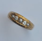 An attractive pearl and diamond boat shaped mourni