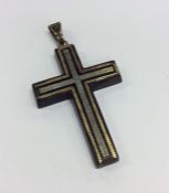 A piqué cross with loop top. Est. £20 - £30.