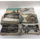 A quantity of old World War and other postcards. E