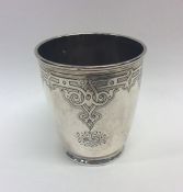 A Russian silver goblet with bright cut decoration