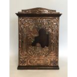 An Art Nouveau copper and stone mounted cabinet. A