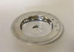 A circular silver armada dish of typical form. Lon