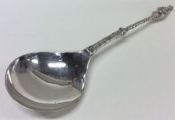 A Continental silver spoon decorated with flowers