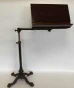 A mahogany mounted and cast iron telescopic music