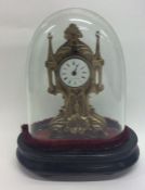 A small French brass mounted mantle clock containe