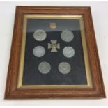 A framed and glazed collection of 19th Century Plymouth medals