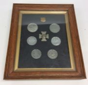 A framed and glazed collection of 19th Century Plymouth medals