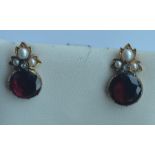 A pair of Antique garnet, pearl and rose diamond e