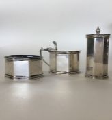 A good quality silver three piece cruet with hinge