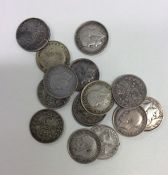 A quantity of silver and other sixpences together