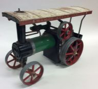MAMOD: A painted steam model of a Showman engine.
