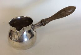 A good Georgian silver brandy pan of typical desig