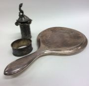 An Edwardian silver hand mirror with swag decorati