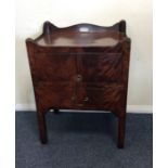 A Georgian mahogany hinged top single drawer commo