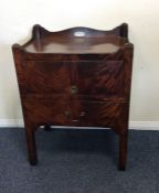 A Georgian mahogany hinged top single drawer commo