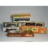 Two OO/HO gauge loco's consisting: Rivarossi 2-8-2 loco and tender black and red livery and AHM