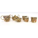 A Royal Crown Derby five piece teaset decorated in the traditional Imari 2451 pattern including a