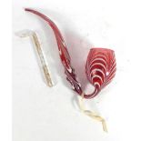 A Victorian cranberry glass pipe, possibly Nailsea,